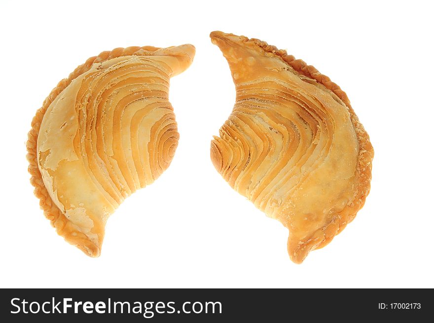 Two Crispy Curry Puff On A White Background