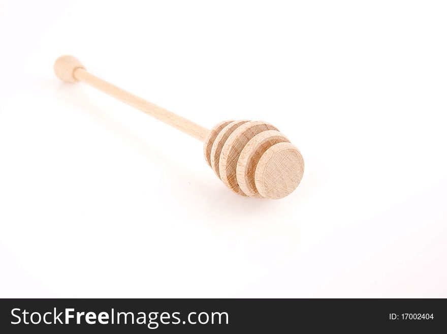Wooden honey of the white background