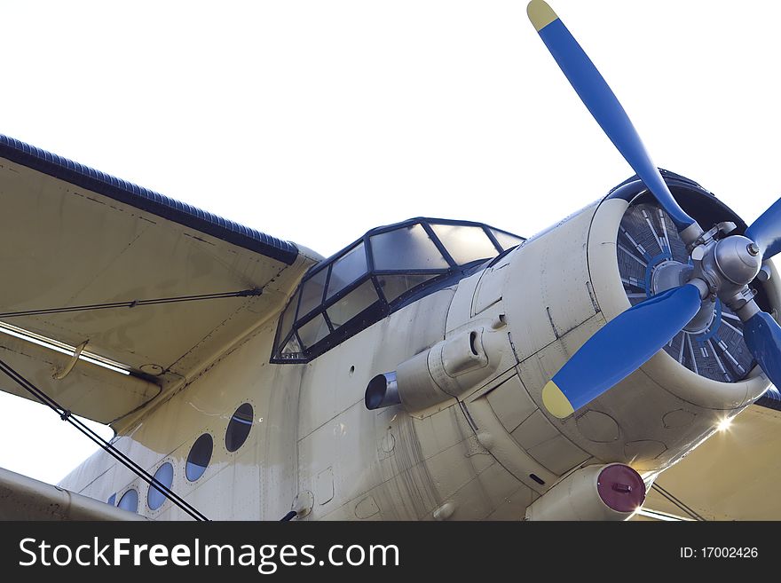 Cockpit of vintage biplane with blue propeller. Cockpit of vintage biplane with blue propeller.