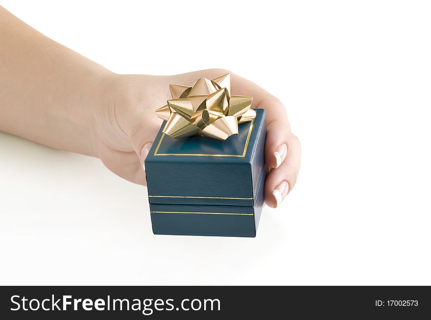 Gift in box on the hand isolated on white