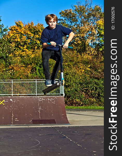 Child Going Airborne With  Scooter