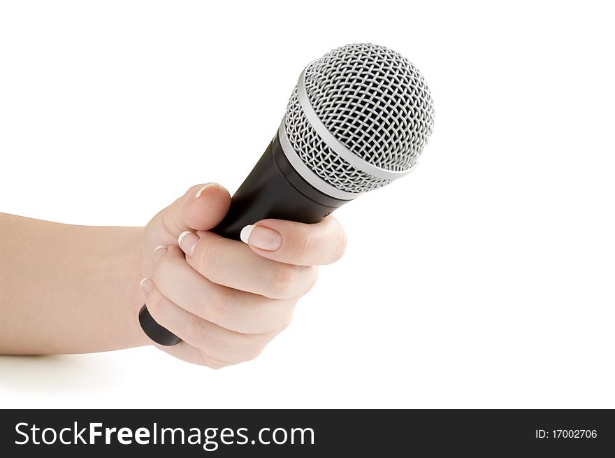 Microphone in hand isolated on white