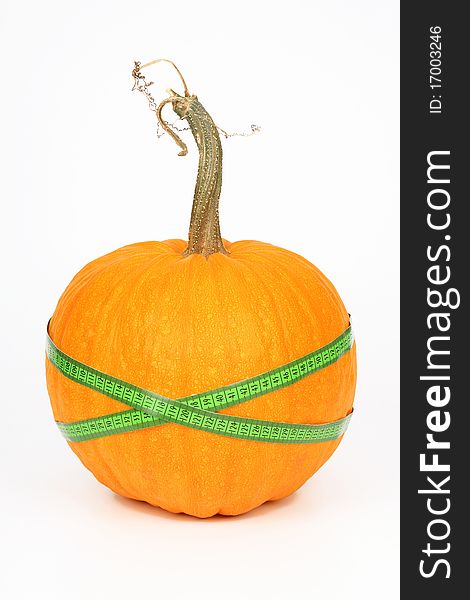 Pumpkin and green measured tape