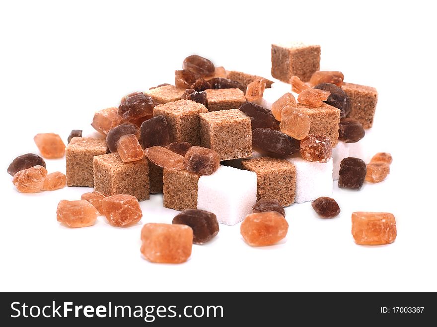 Different kinds of sugar on a white background. Different kinds of sugar on a white background