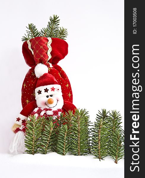 Snowman and gift on the white background. Snowman and gift on the white background