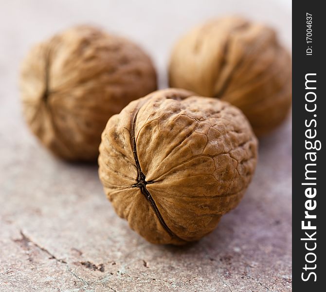 Closeup of walnuts ona stone background