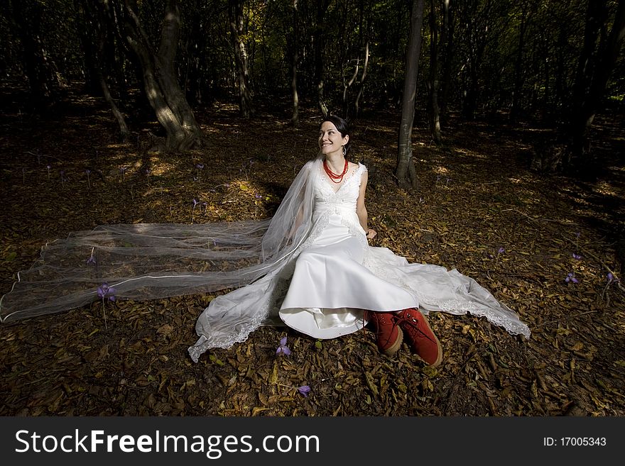 Trash the dress in autumn forest