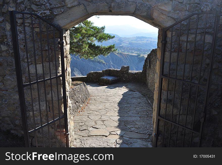 The gate of the ancient Canossa castle