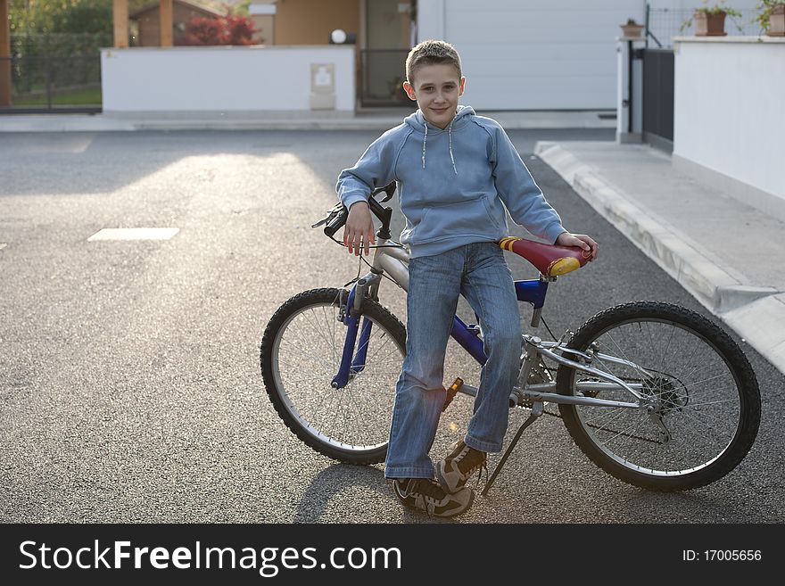 Little Boy With Bike