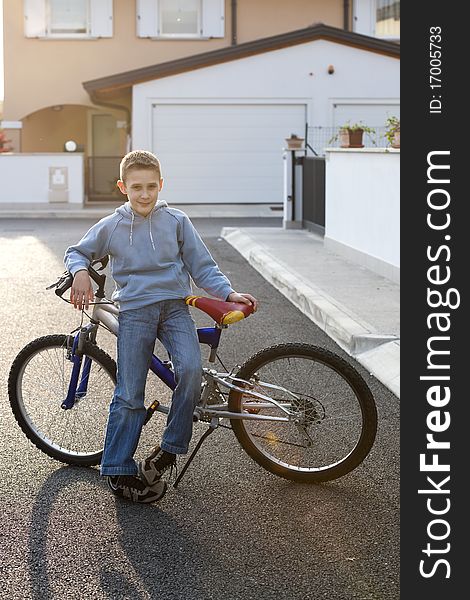 Little boy with his bike. Little boy with his bike