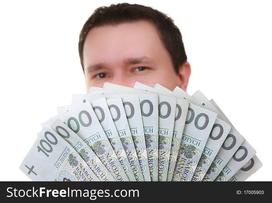 A bunch of polish money. Banknotes in denominations of 100th. Face in background. A bunch of polish money. Banknotes in denominations of 100th. Face in background.