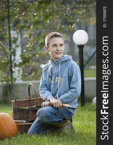 Little boy doing gardening, outdoors. Little boy doing gardening, outdoors