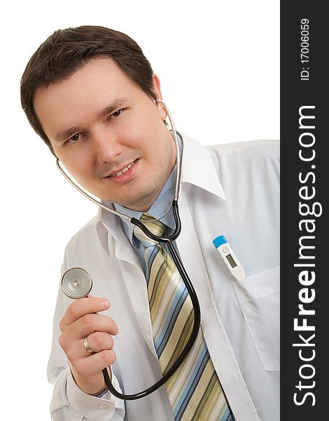 Young adult caucasian doctor smiling. Brunette hair.White background. With stethoscope. Young adult caucasian doctor smiling. Brunette hair.White background. With stethoscope.