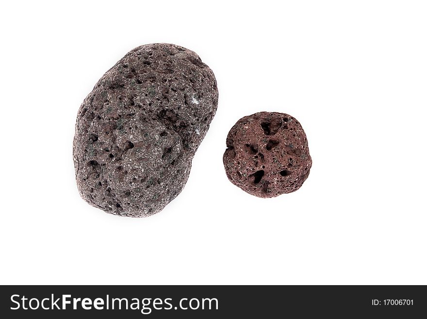 Two volcan lavic stones isolated on white