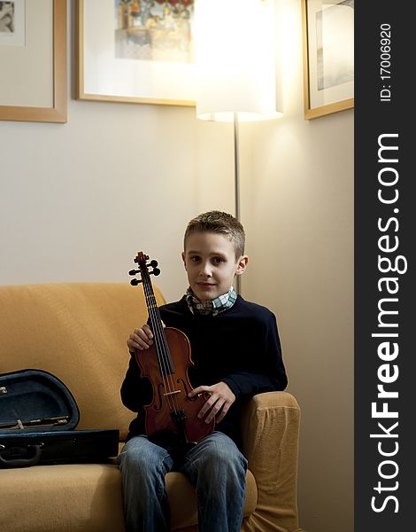 Young boy with his violin. Young boy with his violin