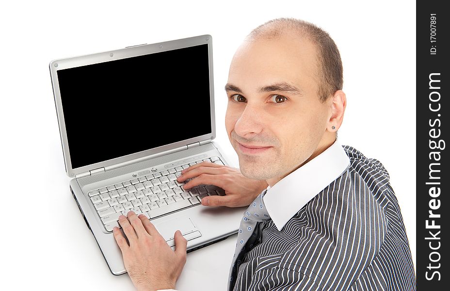 Young businessman using laptop