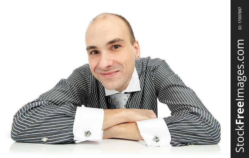 Smiling handsome businessman. Isolated over white background