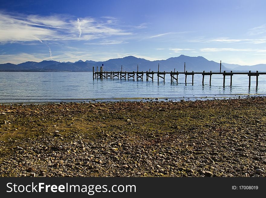 A jetty at lake Chiemsee in autumn