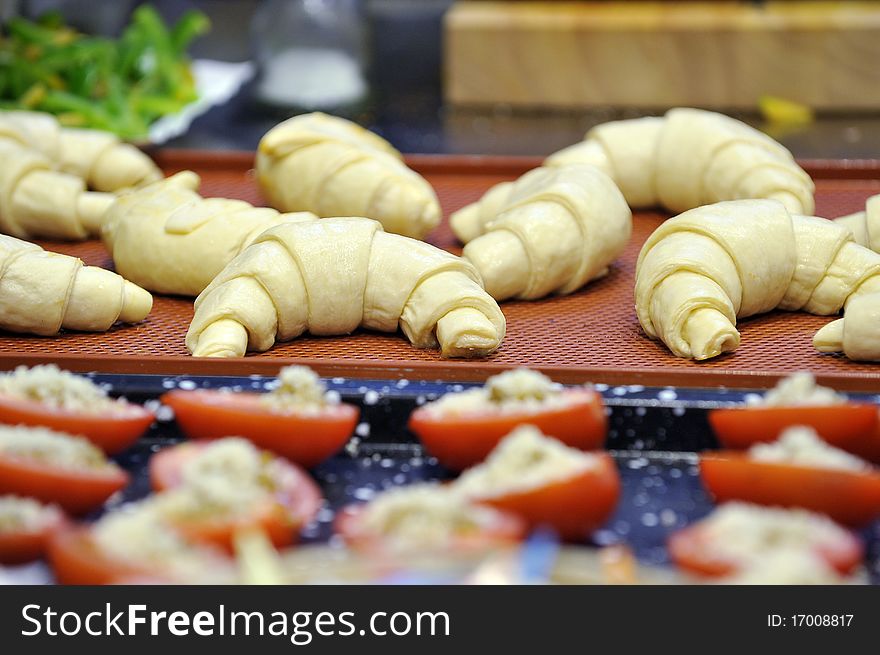 Tomatoes stuffed with cheese and tasty baked on tray