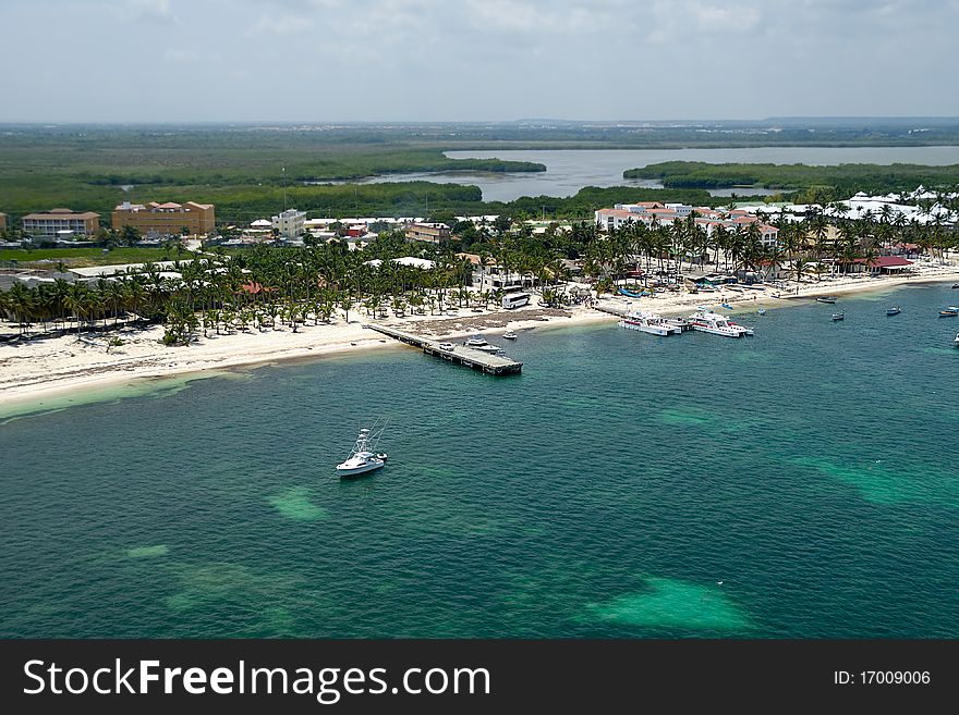 A beutiful beach in the caribbean and boats. Taken form helicopter. Dominican Republic. A beutiful beach in the caribbean and boats. Taken form helicopter. Dominican Republic.