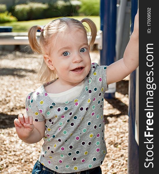 Blonde Girl At Playground