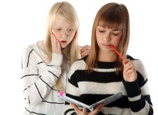 Two Beautiful Girls Read Diary Book Stock Images Two Beautiful Girls Read Diary Book Stock Images