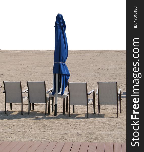 Chairs and umbrella on sandy beach