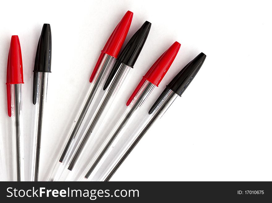 Black feathers and red on a white background. Black feathers and red on a white background