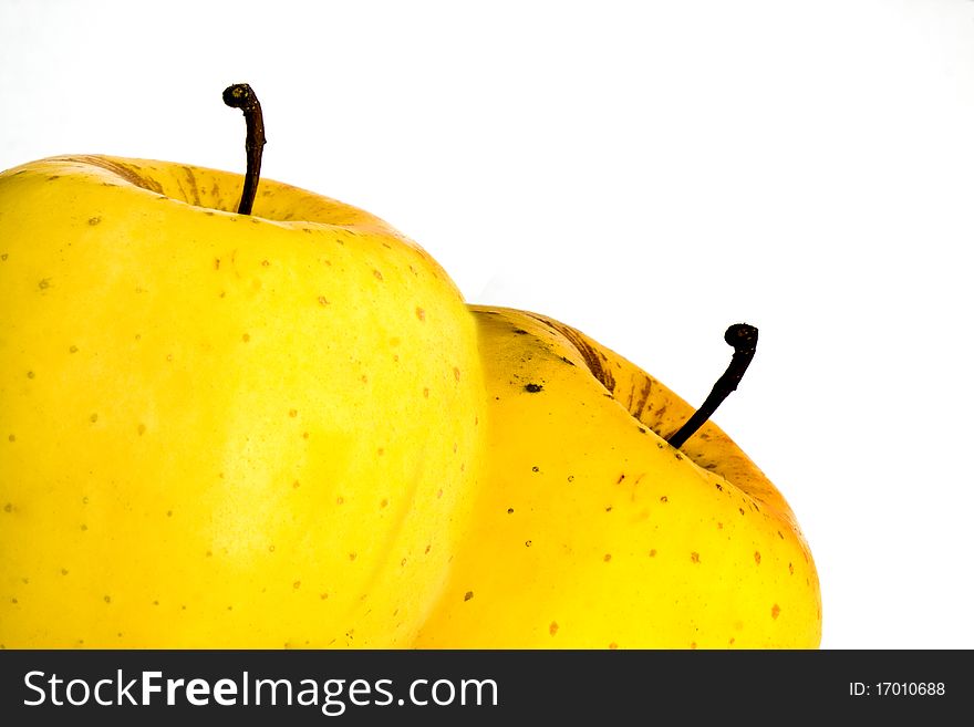 Yellow apples on a white background