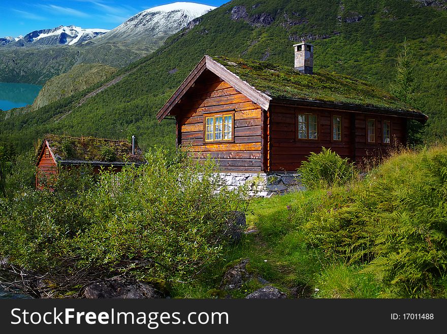 Autumn Norway landscape with hut