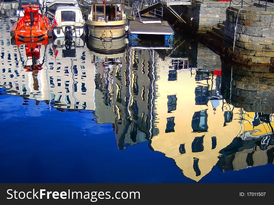 Picturesque landscape with Yachts and reflection.