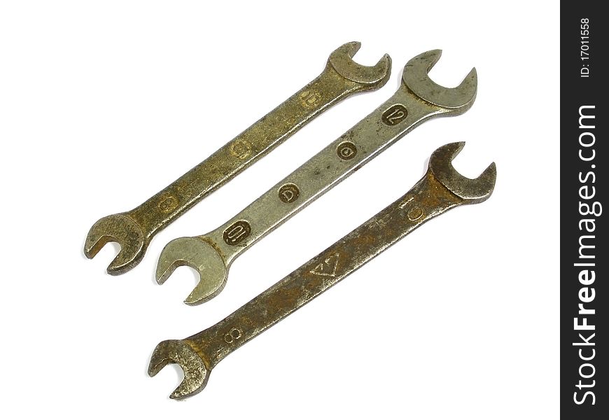 Old wrenches on the white isolate background