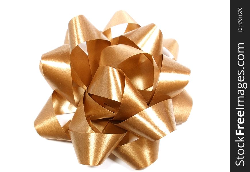 Dark gold bow on the white isolate background