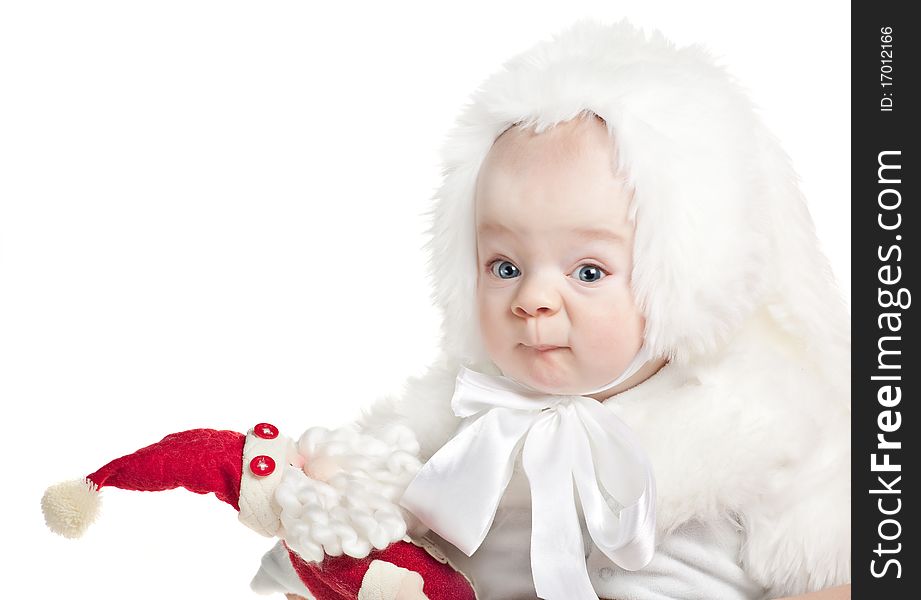 Beautiful baby boy in a rabbit fancy dress on a white background