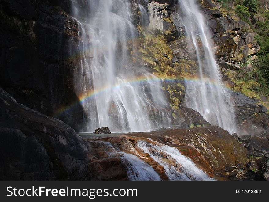 Rainbow on acquafraggia waterfall in italy. Rainbow on acquafraggia waterfall in italy