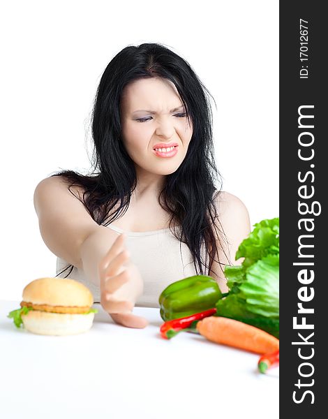 Beautiful woman  with vegetables over white background