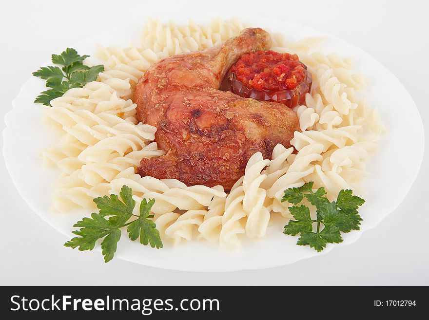 Grilled chicken on a plate with pasta. Grilled chicken on a plate with pasta