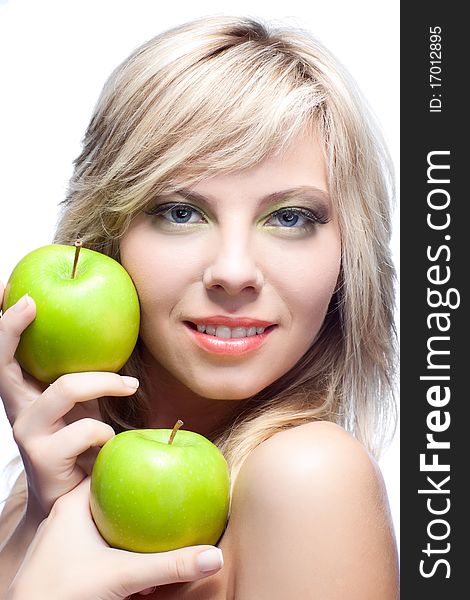 Beautiful woman over white background with apples. Beautiful woman over white background with apples