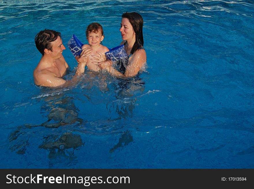 Family In Pool