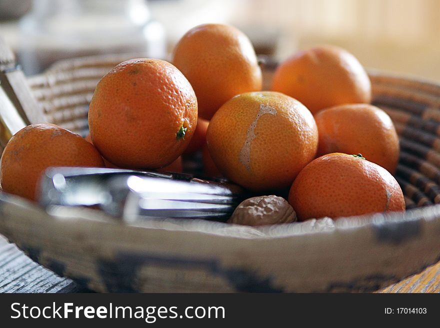 Group of mandarins in a wickers bowl