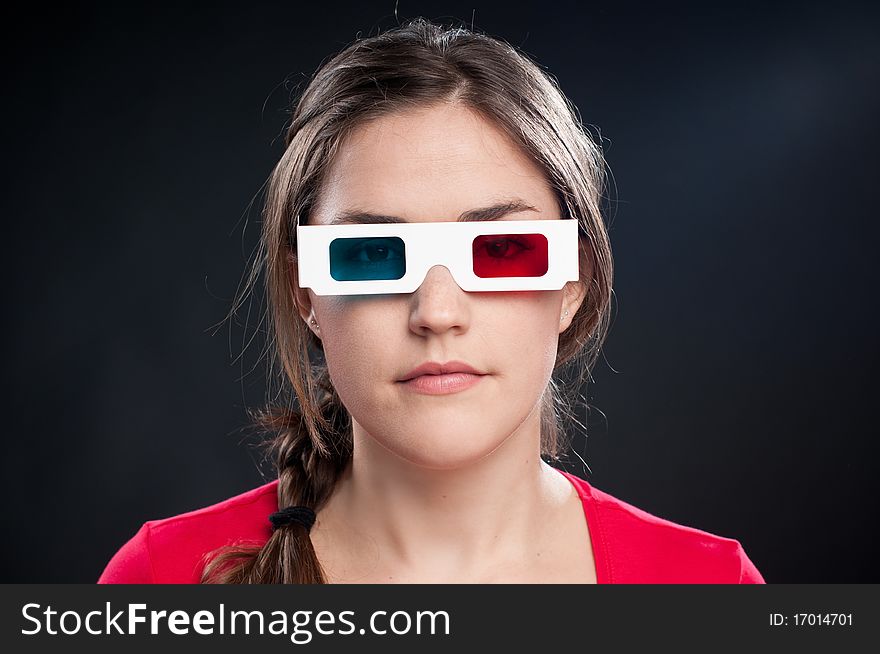 Teenager with 3D glasses watching movie