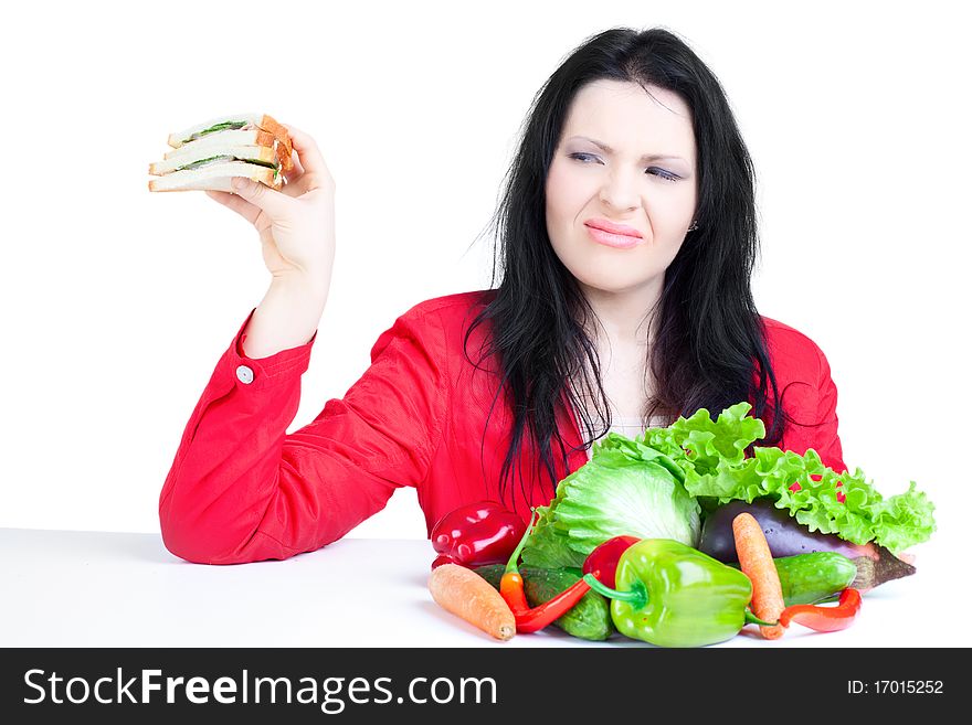 Beautiful woman  with vegetables over white background