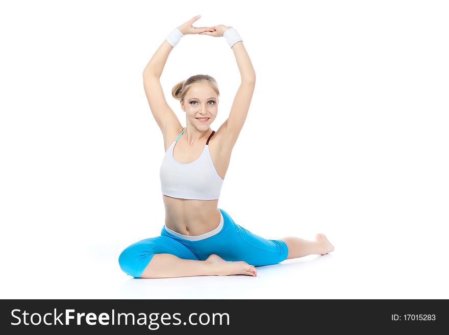 Beautiful woman   over white background in fitness. Beautiful woman   over white background in fitness