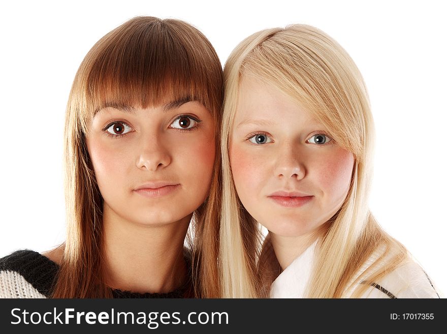 Portrait two girls of the blonde and brunettes insulated on white background