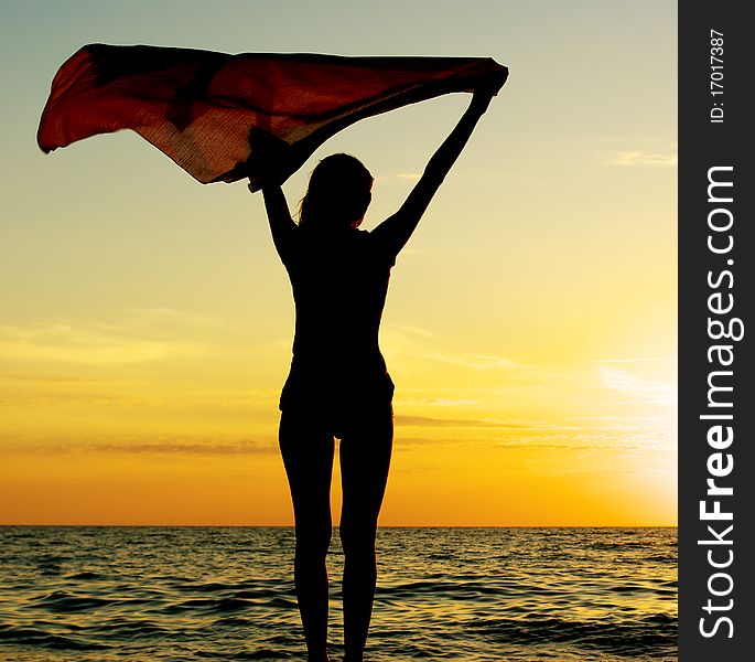 Girl With Kerchief On The Sunset