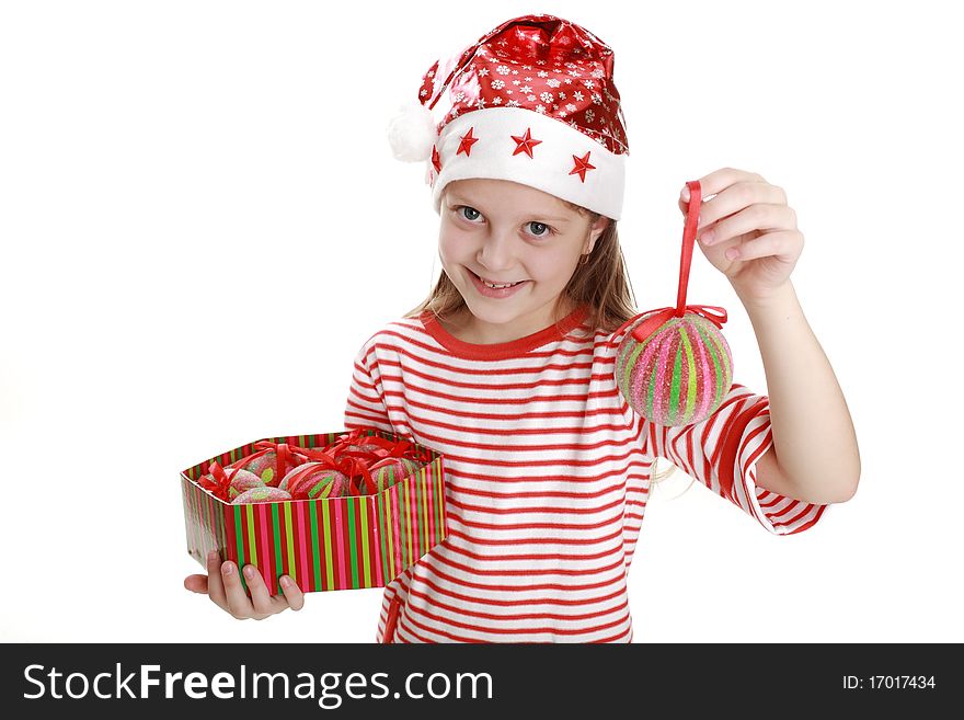 An image of a little girl with balls. An image of a little girl with balls