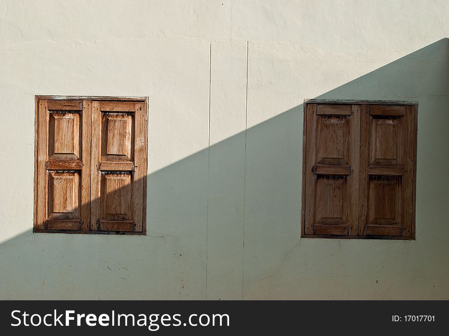 Window wood on a white wall