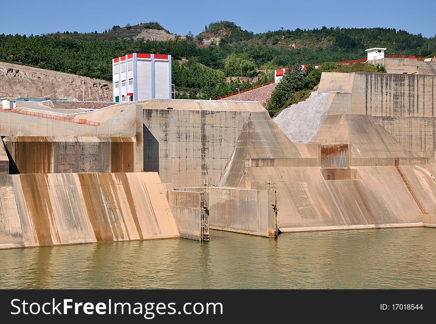 Water electricity plant on yellow river in China, as big construction made by concrete built beside yellow river, composed by plant buildings and water dam. Water electricity plant on yellow river in China, as big construction made by concrete built beside yellow river, composed by plant buildings and water dam.