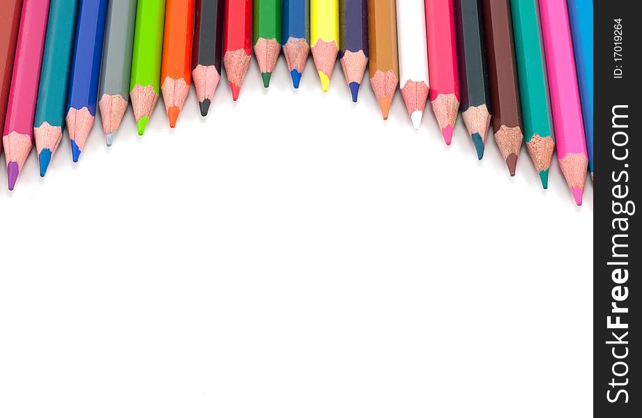 Studio shot of Assortment of coloured pencils on white background