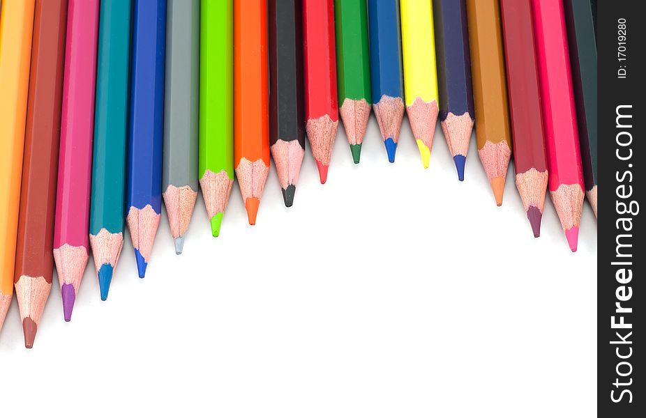 Studio shot of Assortment of coloured pencils on white background